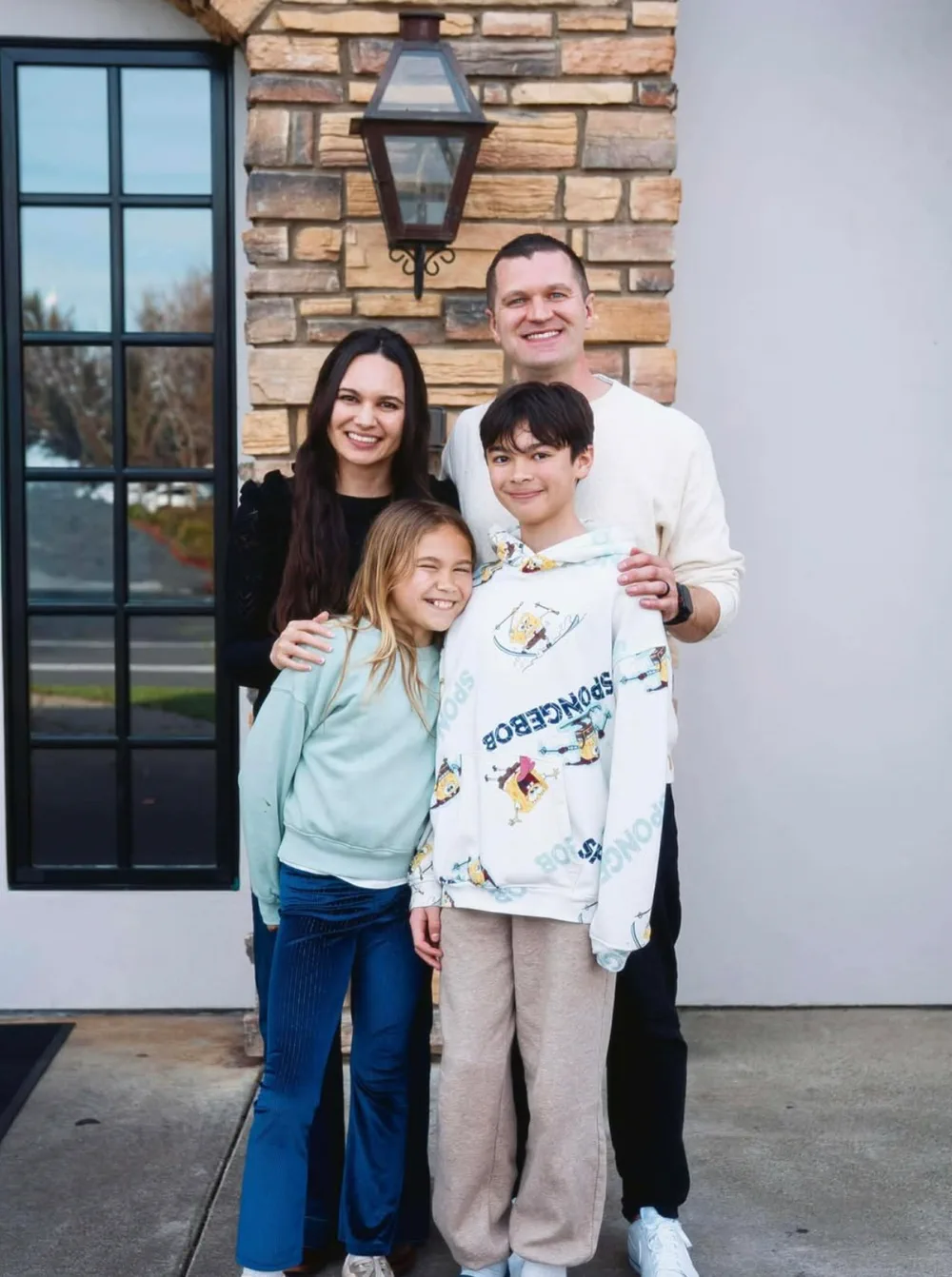 The Volk family — Jony, Maria, and their two kids